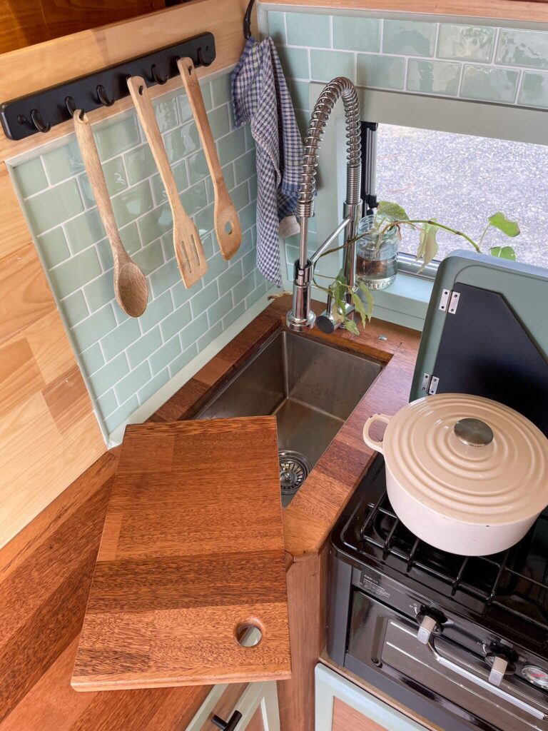 Revanped Custom Unique Van Conversions Sunshine Coast - Toms Ford Transit - Full size kitchen sink with sprayer tap, built in gas stove and backsplash tiling