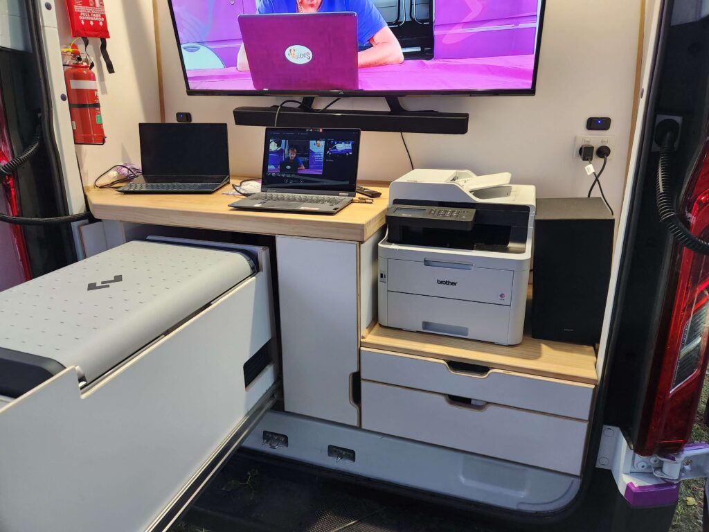 4 Voices Mobile Office Fitout - Revanped Custom Van Conversions Sunshine Coast - Wall mounted flat screen tv, laptop, printer with 240V inverter power & 12v electrical system