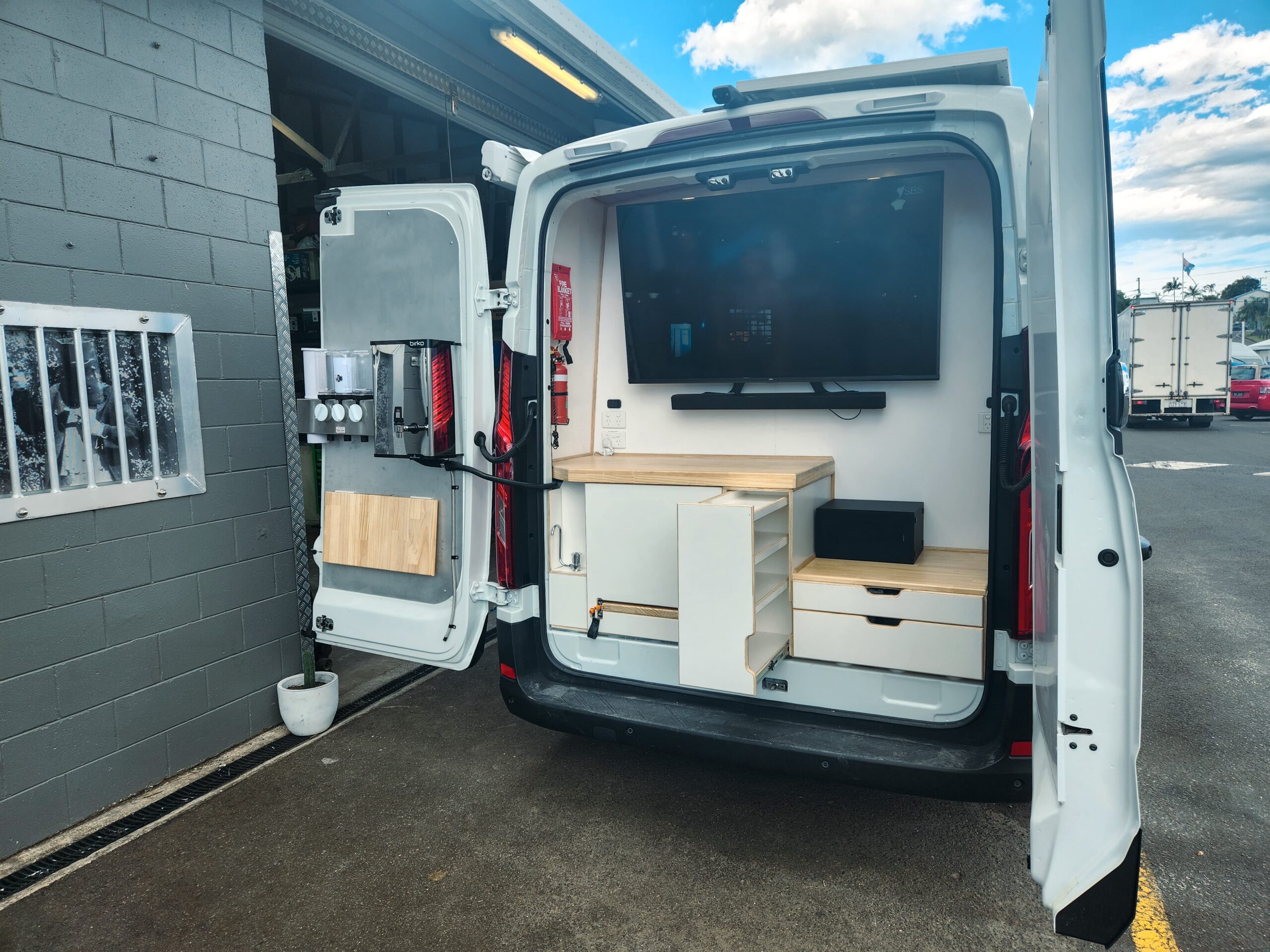 4 Voices Mobile Charity Office Fitout - Revanped Custom Van Conversions Sunshine Coast