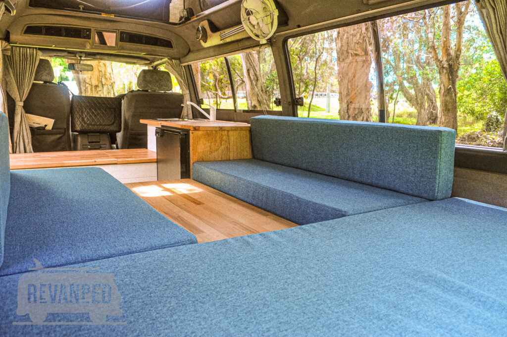 Revanped Bespoke Camper Van / RV Fitout - Ian Toyota Hiace - Convertible Lounge Dining Bedroom Area